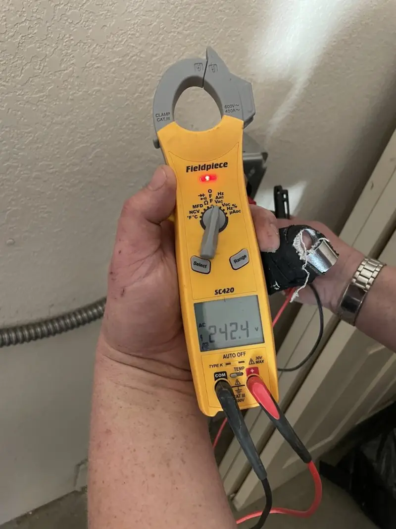 Voltage testing with clamp meter during Circuit Breaker Repair in Nowthen